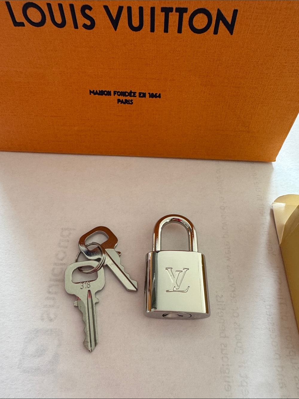 Louis Vuitton Silver Padlock and Key Set